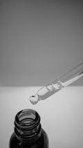 Snail Mucin Essence serum bottle